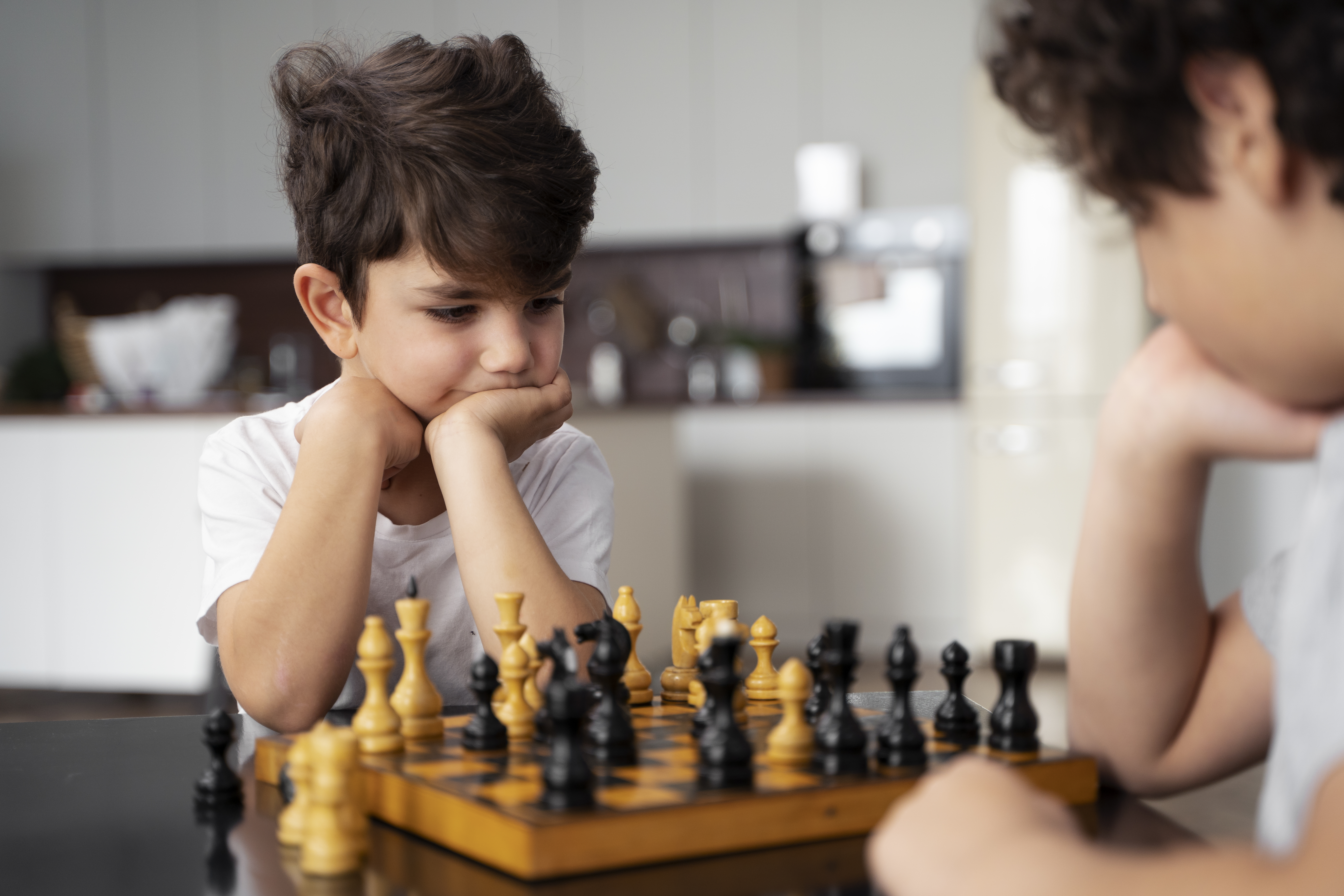 young-kids-playing-chess-together